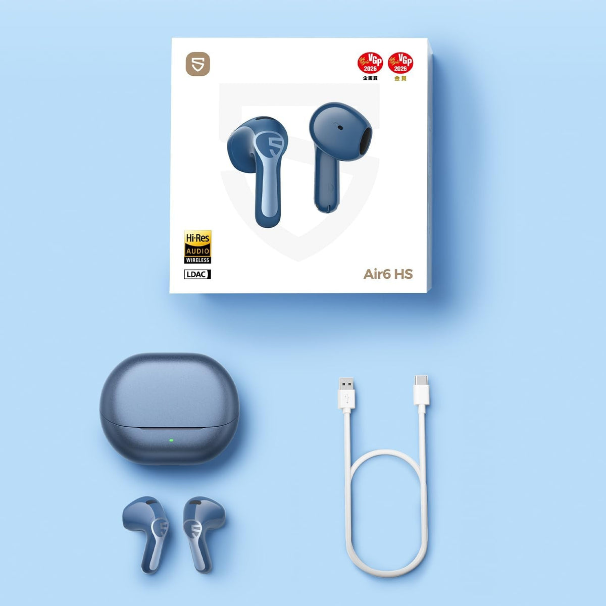 Everything in the Air6 HS box in blue: retail packaging, blue charging case, blue earbuds and a USB-C charging cable