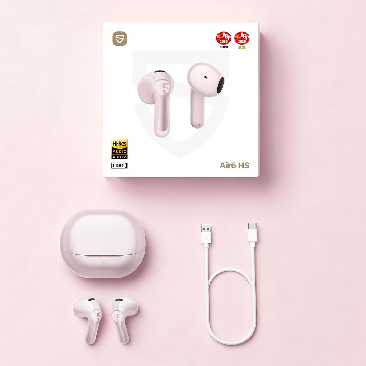 Everything in the Air6 HS box in pink: retail packaging, pink charging case, pink earbuds and a USB-C charging cable